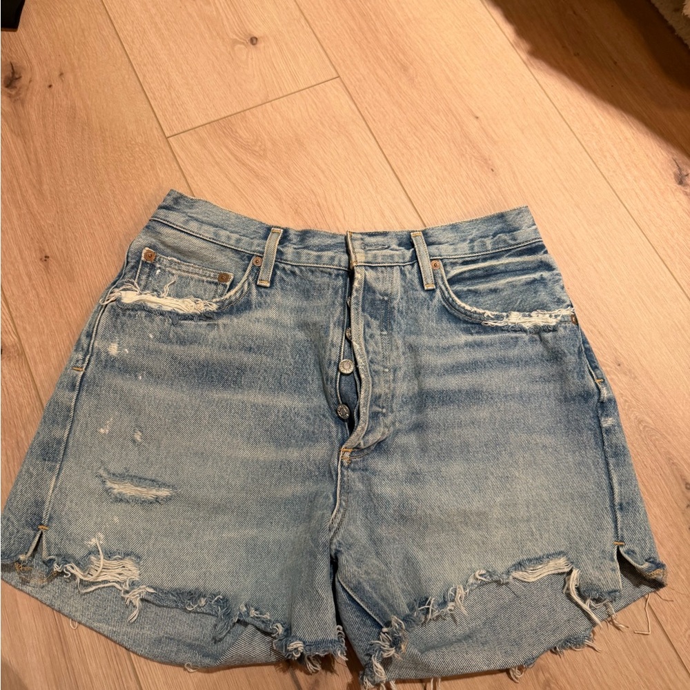 Agolde Light Wash Distressed Denim Cutoff Shorts